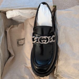 Gucci Men's Black Leather Loafers with Silver Accent